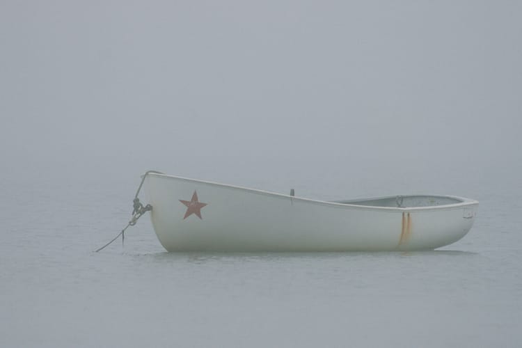 a boat in the fog, provincetown, usa. by leonie wise